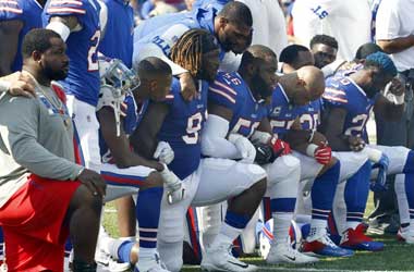 NFL Bans Players From ‘Taking A Knee’ During The National Anthem