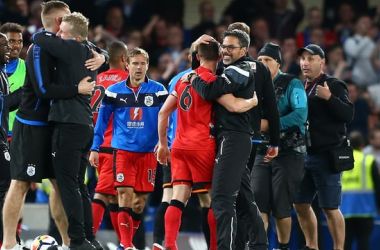 Huddersfield secure safety, as Spurs clinch Champions League spot