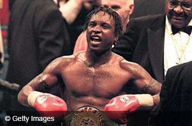 Nigel Benn celebrates after knocking out Gerald McClellan in 1995