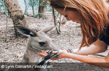 Lynn Gilmartin feeding a kangaroo