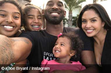 Kobe Bryant with his daughters and wife