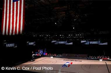 empty court and bench are shown with no signage ahead of scheduled game