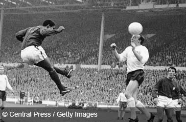 Nobby Stiles winning a header duel with Eusebio during FIFA World Cup 1966