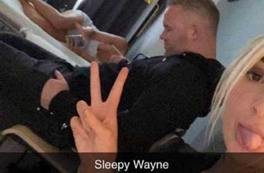 Wayne Rooney Sleeping whilst two women poke fun