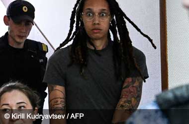 Brittney Griner looking shocked whilst being taken to a Russian court