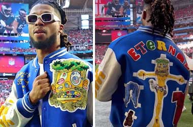 Damar Hamlin wearing "Travis Jesus" Jacket