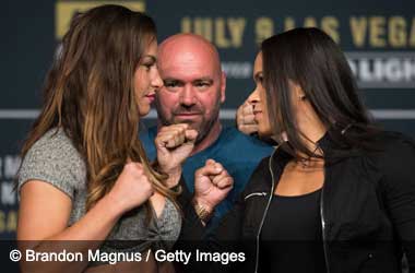 Miesha Tate and Amanda Nunes at UFC 200