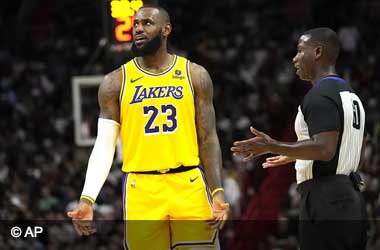 A referee during LA Lakers vs Miami Heat game explains decision to Lebron James