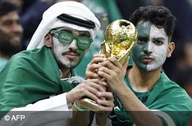 Saudi Arabia football fans with a replica of the FIFA World Cup