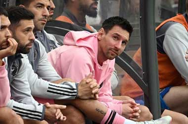 Lionel Messi sitting on the bench during match against Hong Kong select XI