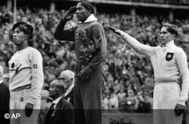 Jesse Owens wins Gold at the 1936 Berlin Olympics